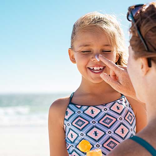Sunscreen on child